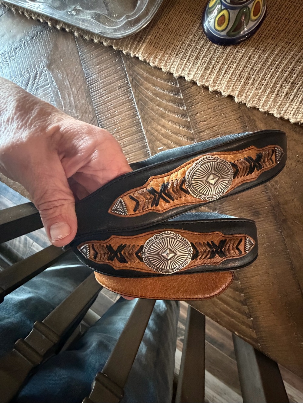 Ariat Black and Tan Leather Men’s beltwith Concho Detail
